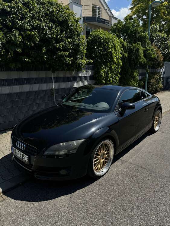 TT