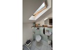 Helle 4,5 Zimmer Dachgeschoßwohnung mit großem Grundstücksanteil und Carport in Südhessen