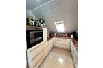 Helle 4,5 Zimmer Dachgeschoßwohnung mit großem Grundstücksanteil und Carport in Südhessen