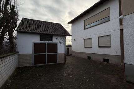 Haus zum Kaufen in Böhl-Iggelheim 250.000 € 200 m² 7 zimmer