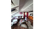 Helle 4,5 Zimmer Dachgeschoßwohnung mit großem Grundstücksanteil und Carport in Südhessen
