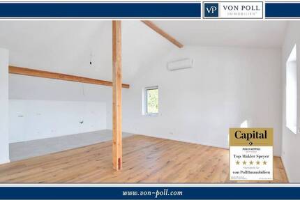 Dachgeschoss-Wohnung mit Sichtgebälk, Aufzug und großem Balkon