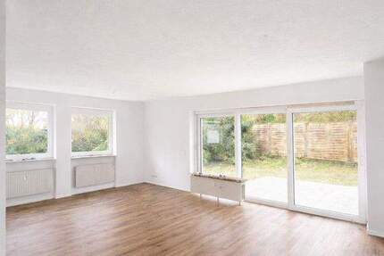 Exklusive 3 Zi.- EG-Wohnung mit großem Garten, Terrasse & Doppelgarage - LU 3 zimmer