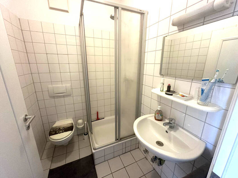 GLOBAL INVEST SINSHEIM | Stilvolle 1-Zimmer-Wohnung im Barockhaus am Mannheimer Schillerplatz