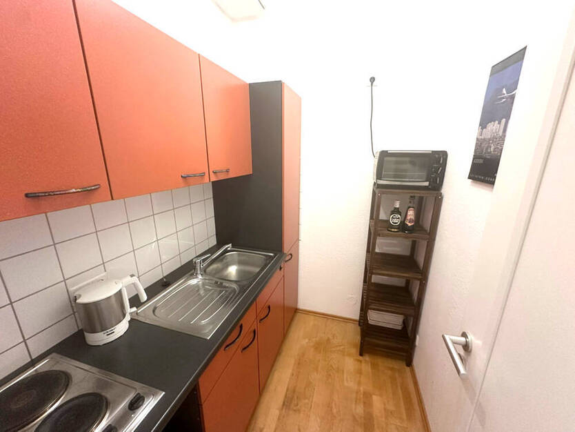 GLOBAL INVEST SINSHEIM | Stilvolle 1-Zimmer-Wohnung im Barockhaus am Mannheimer Schillerplatz